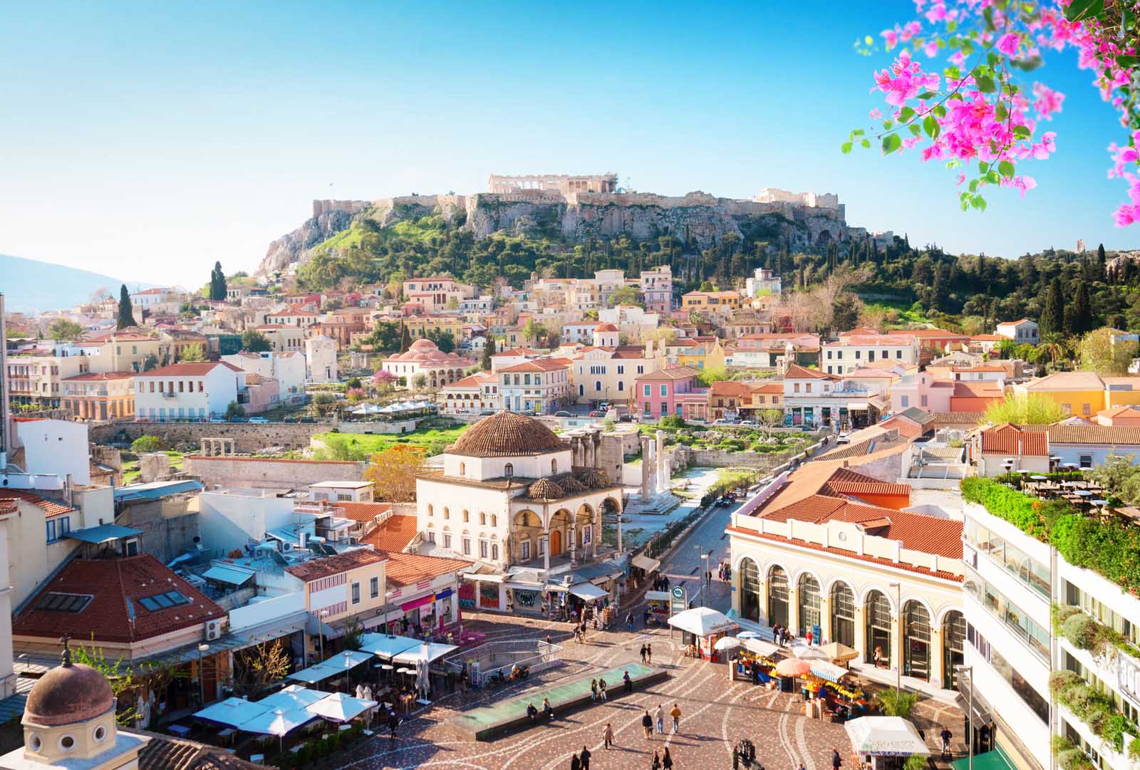 Skyline of Athenth with Moanstiraki square and Acropolis hill, Athens Greecer with flowers